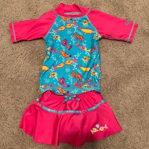 The sweetest little swim skirt and rash guard for size 12-18 months